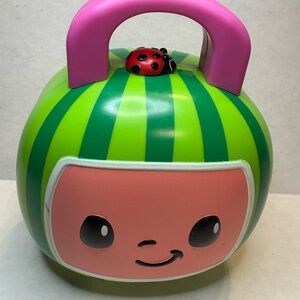 Smiling Green and Pink Toy with Ladybug Accent